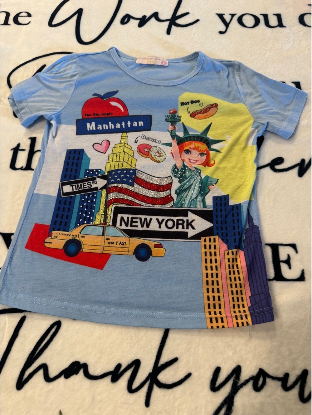 Girls' short-sleeve light blue T-shirt with New York graphic print, size 10/12